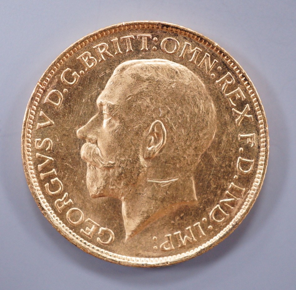 A George V 1915 gold sovereign.